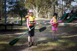 Two students preparing for canoeing