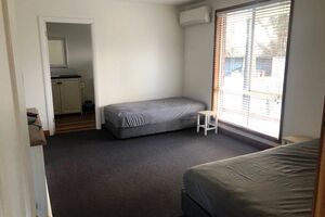 Accessible Bedrooms at Log Cabin Homestead Creswick