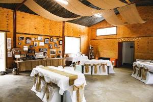 Barn hall decorated for wedding reception