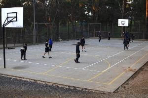 Students on camp playing basketball