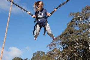 Girl jumping on Bungee Trampoline