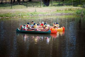 School group rafting up on in canoeing activity