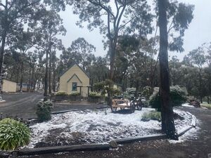 Snowing at The Chapel - Log Cabin camp