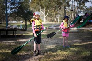 Two students practising paddling 